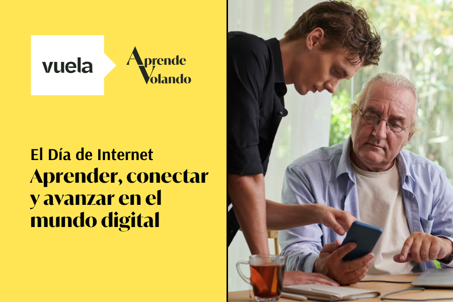 Un hombre joven mostrando a un hombre mayor cómo usar un móvil